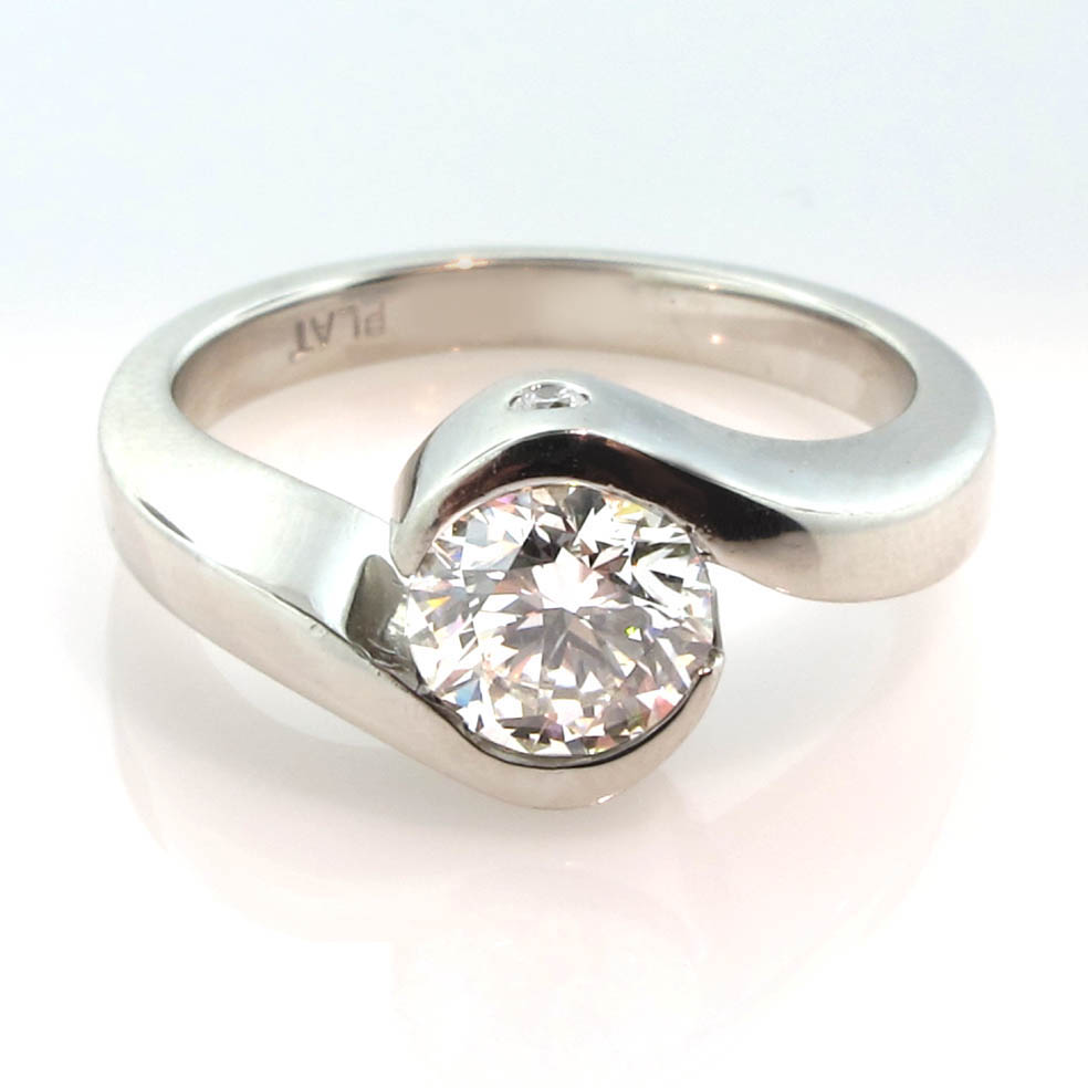 Solitary Brilliant cut engagement ring