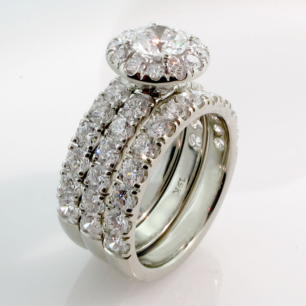 Diamond halo engagement ring with matching double-wedding-ring