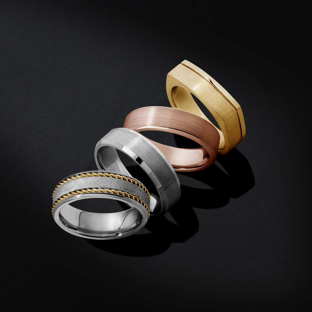 assortment of men's wedding bands